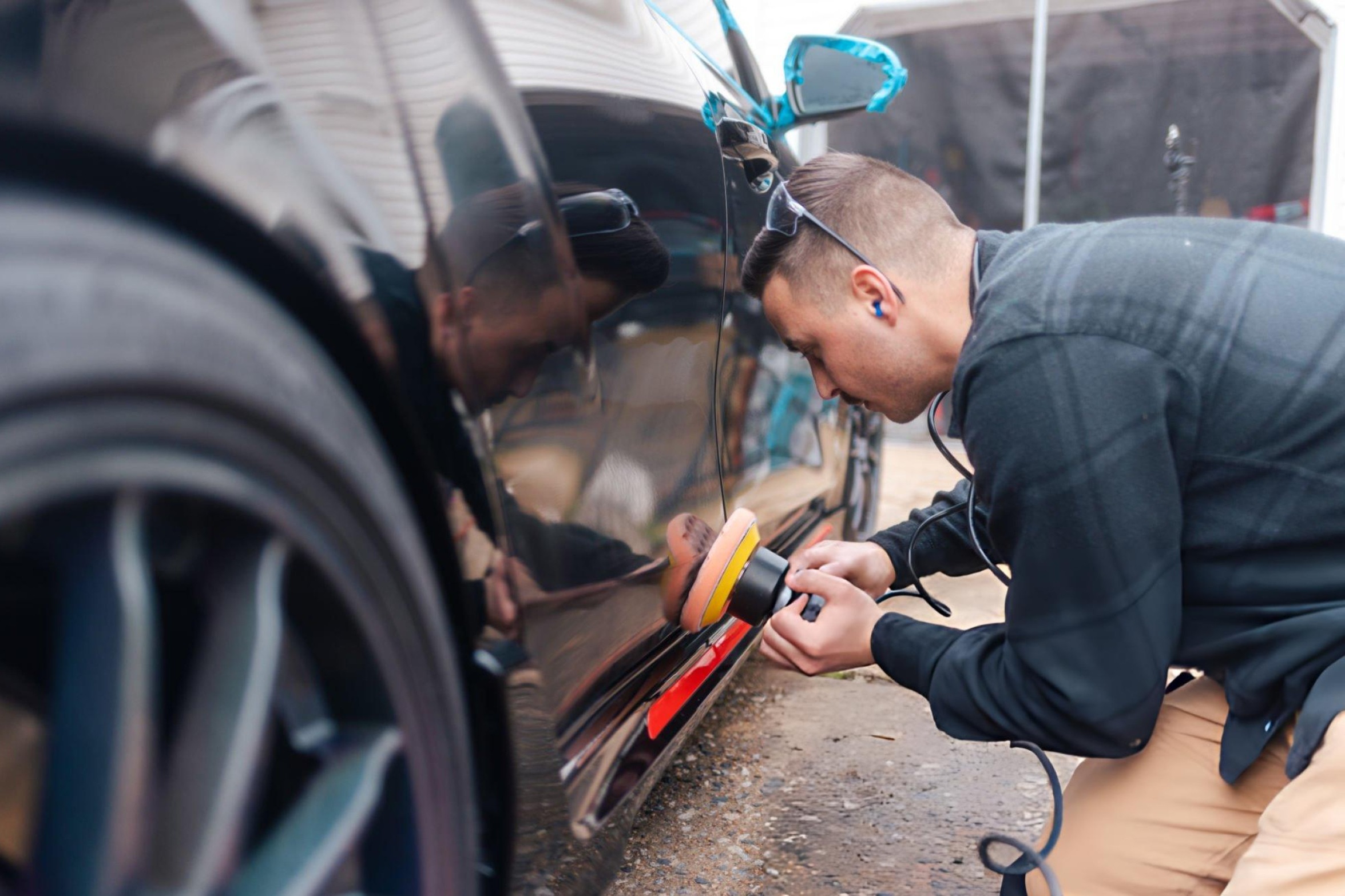 Side-by-side comparison of dual action polisher with orbital movement versus rotary polisher with direct circular motion for automotive paint correction